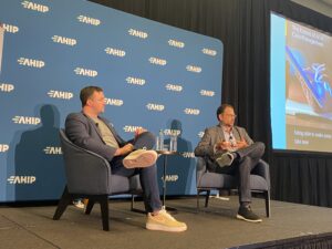 Matt Wilson, Vice President of Product & Growth for CVS Health’s Care Solutions, and Keith Reynolds, Chief Revenue Officer at Welldoc, presenting on-stage at AHIP 2024.